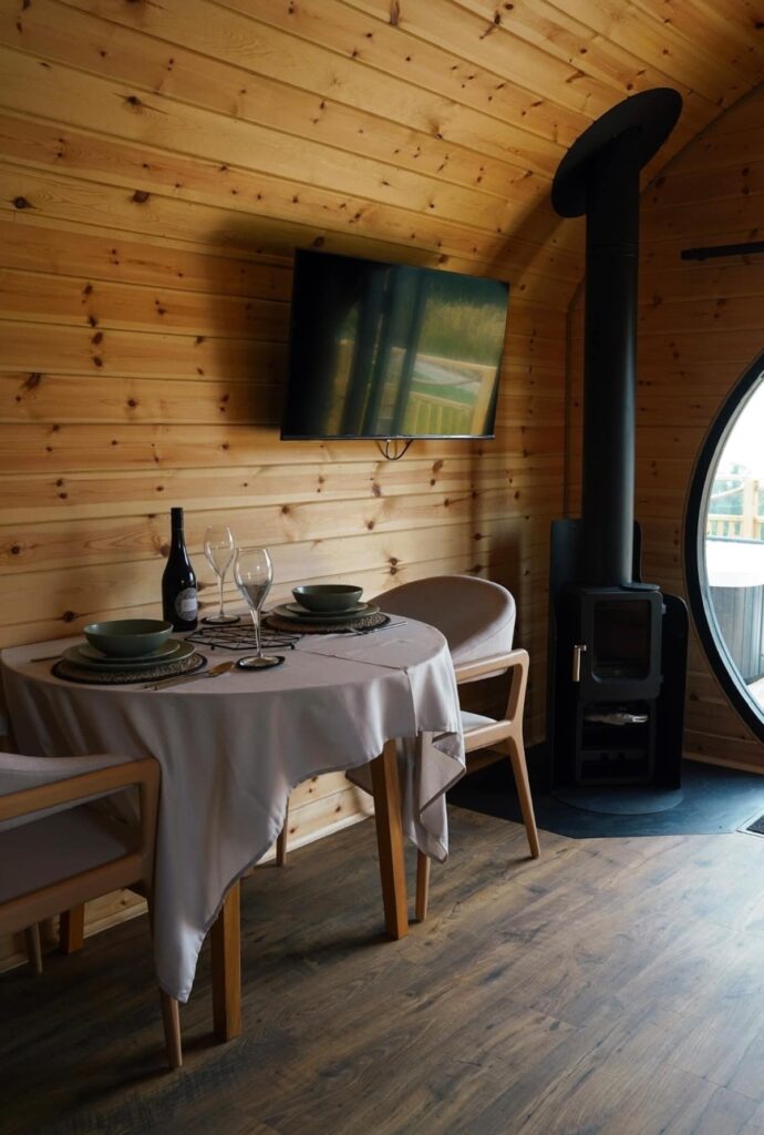 Ty Nansi Glamping Pod dining room table and TV